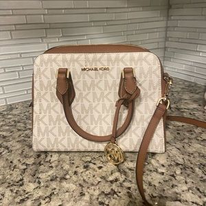 Beige/brown Michael Kors medium purse/satchel style is Ayden